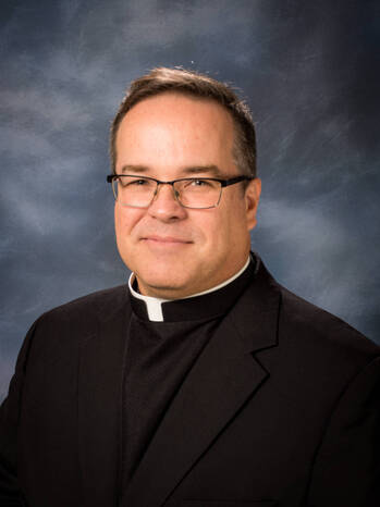 Photo of Reverend Mark R. Riley