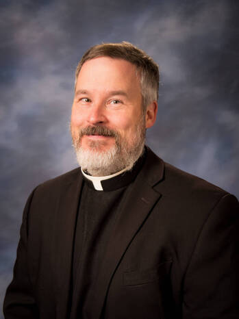 Photo of Reverend John J. Schneider