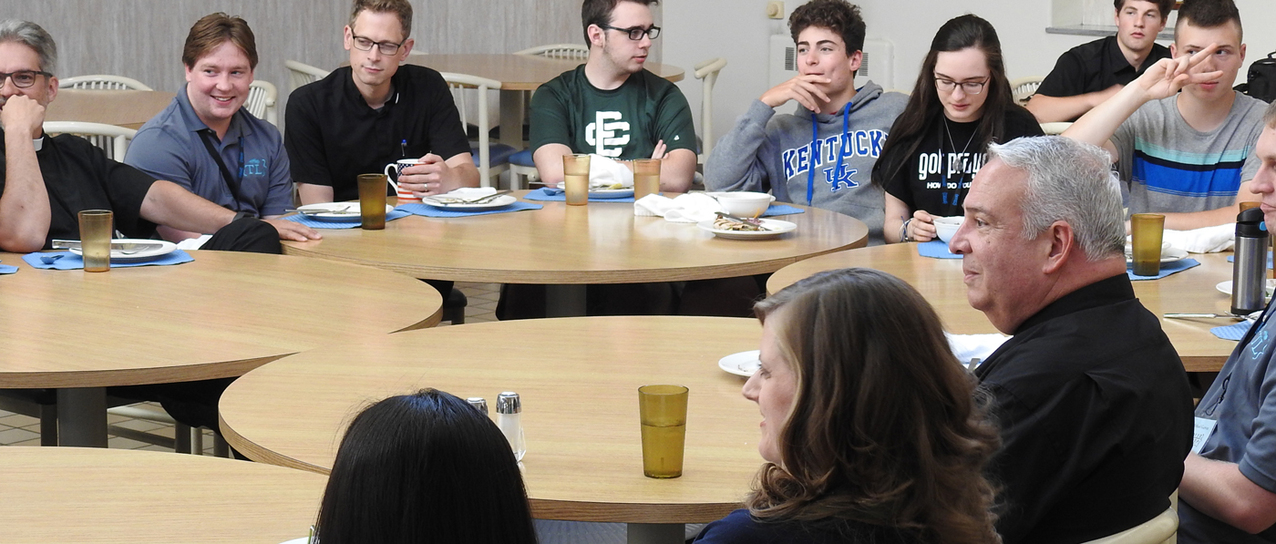 Teens at Tolle Lege Institute break bread, share thoughts with bishop