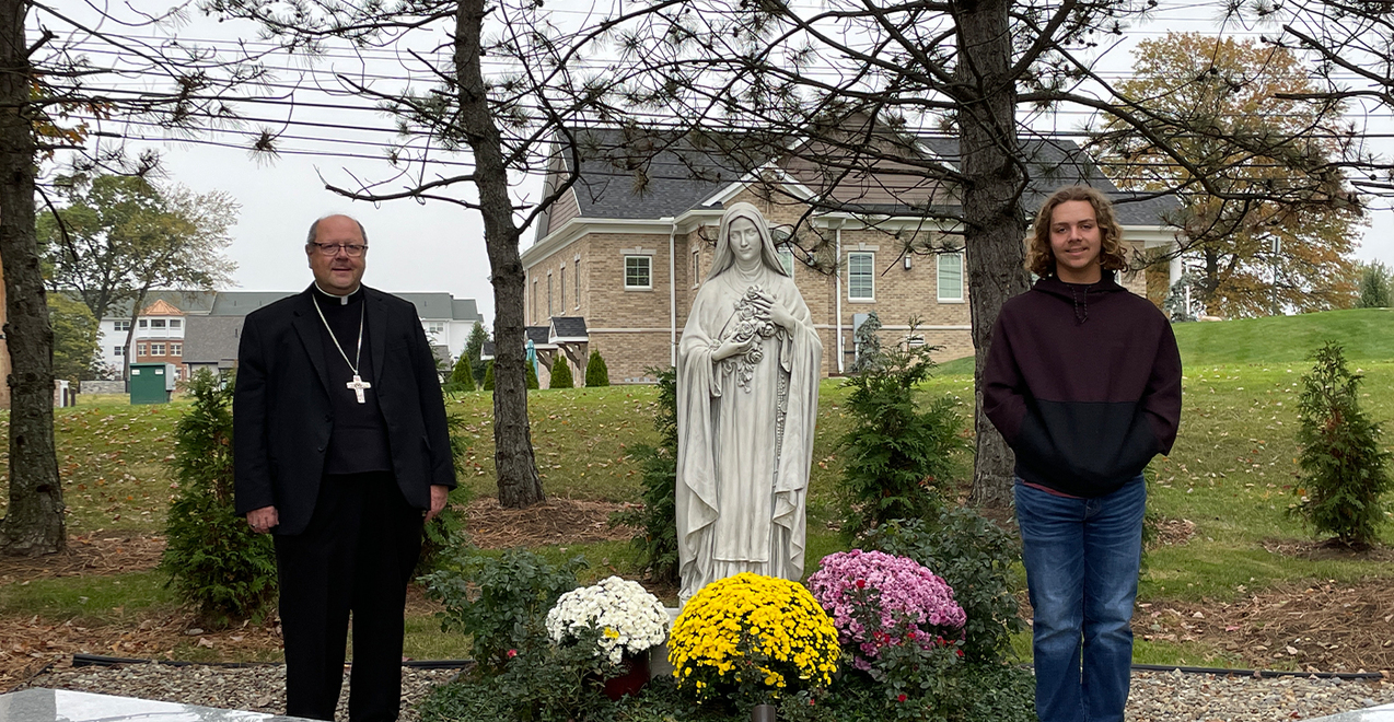 Eagle Scout refurbishes Divine Mercy Shrine in Woods
