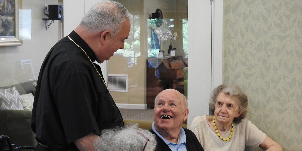 Visit by Bishop Perez brightens Emerald Village residents’ day