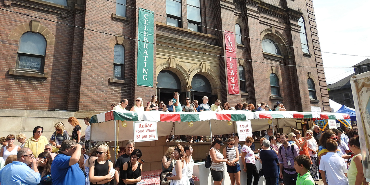 Faithful jam Holy Rosary Church for Mass as the feast of the Assumption celebration begins