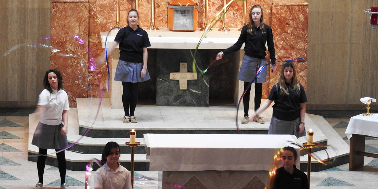 All Saints School celebrates bishop’s visit, basketball title