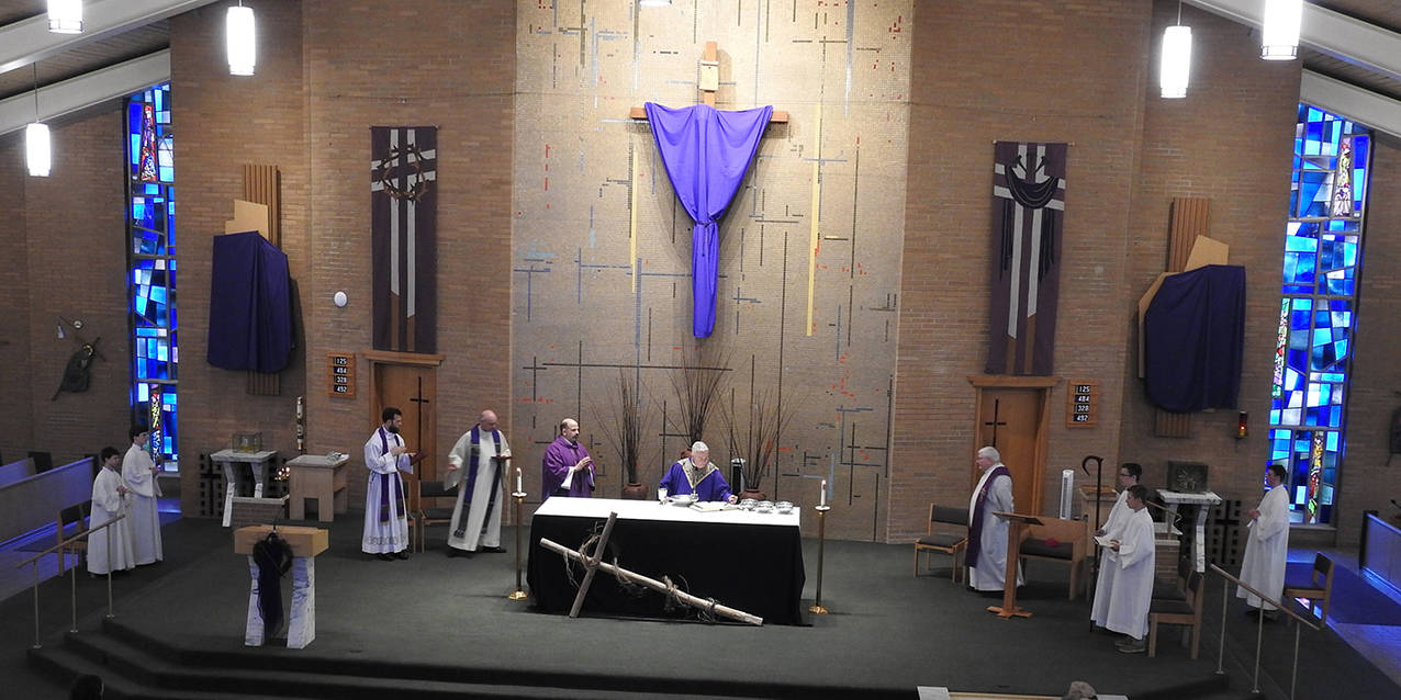 Bishop Perez celebrates Mass, mingles with students at Holy Family School in Stow