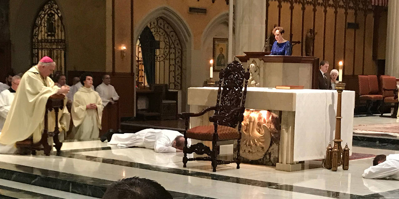 Two men ordained as transitional deacons on the path to priesthood