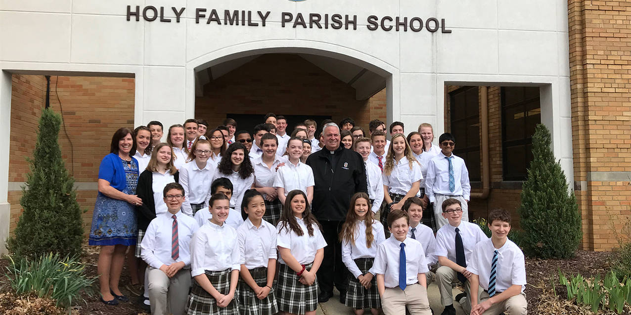 Bishop Perez celebrates Mass, mingles with students at Holy Family School in Stow