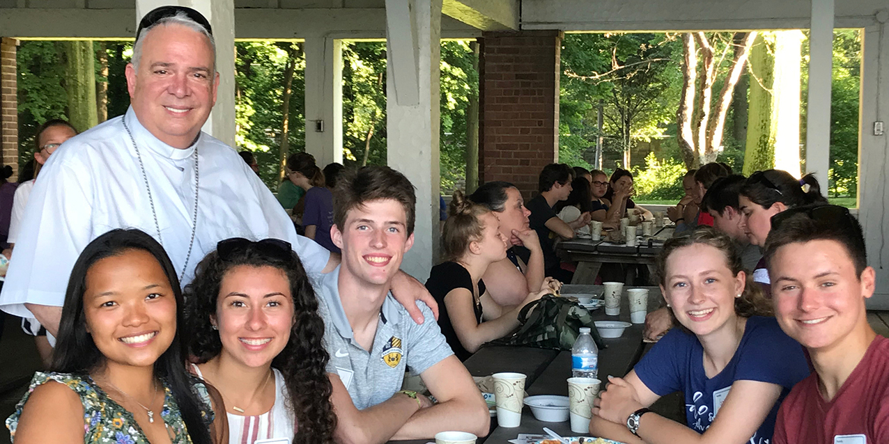 Sultry summer night rally helps teens fan the flame of their faith