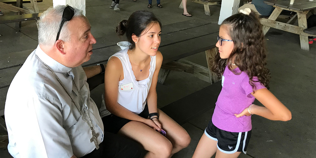 Sultry summer night rally helps teens fan the flame of their faith