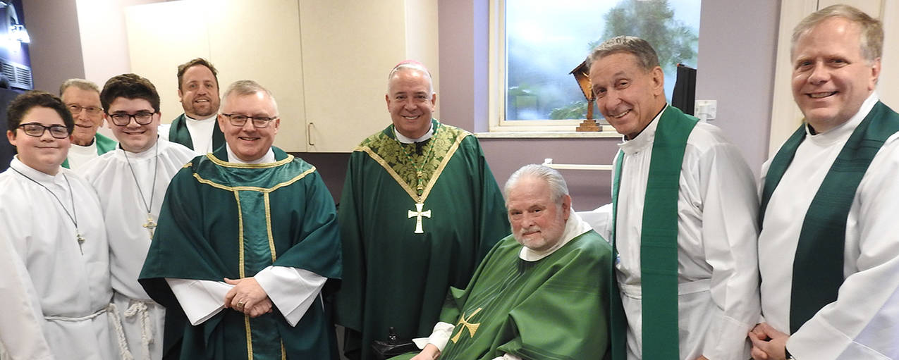 Father John Mullee installed as pastor at St. Michael Parish, Independence